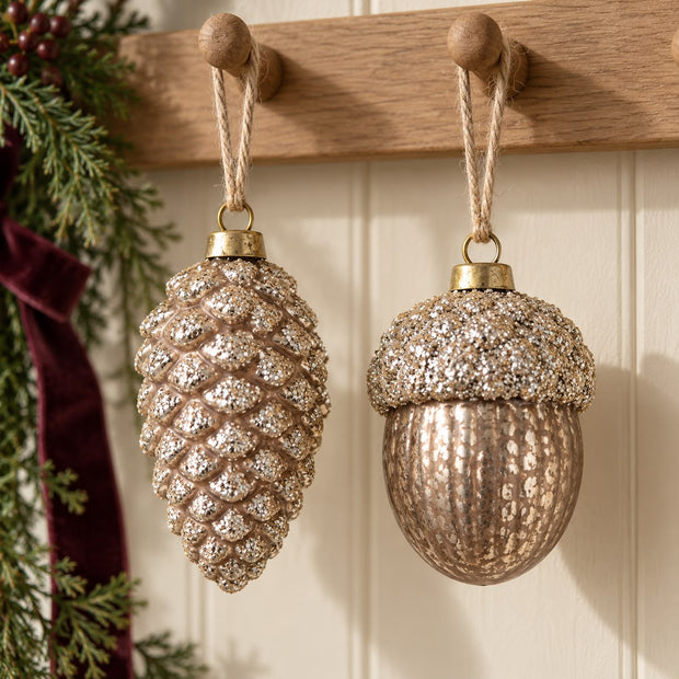 Gold acorn and pinecone glass hanging bauble for Christmas, featuring festive holiday decorations by Heaven Sends.