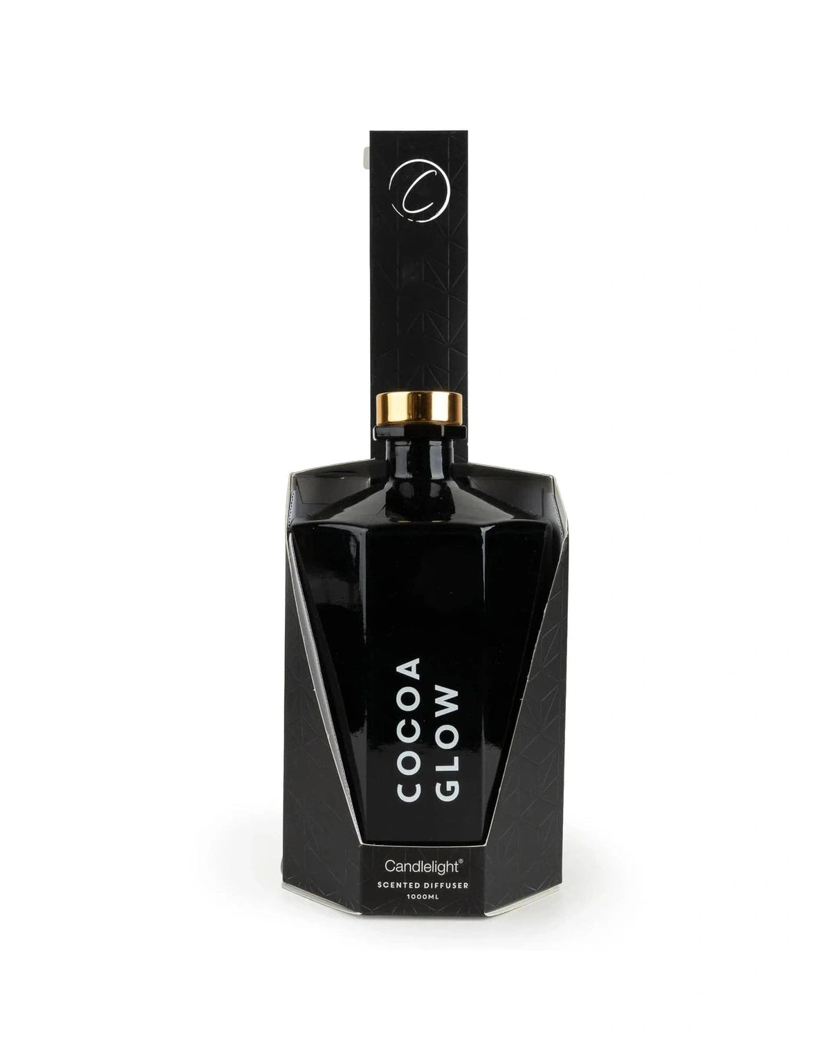 Black diffuser bottle labeled 'Cocoa Glow' on a white background