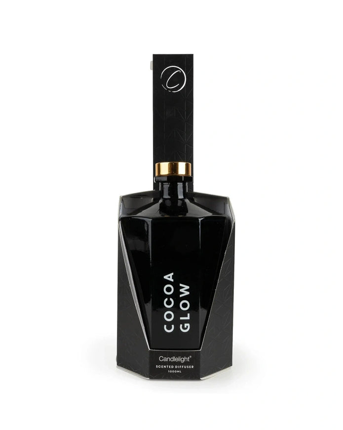 Black diffuser bottle labeled 'Cocoa Glow' on a white background