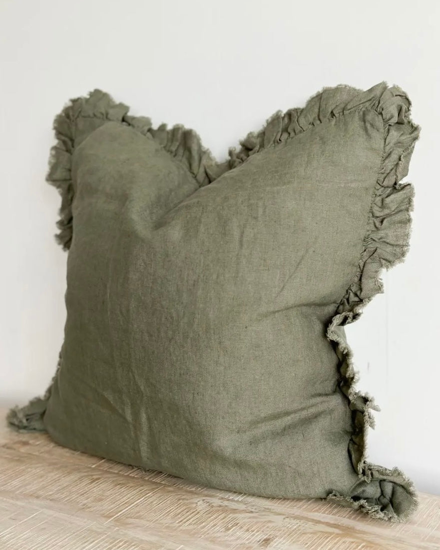 Olive green square linen cushion cover with ruffled edges, soft furnishings by Ellenvale Trade, featuring a stylish ruffled design.