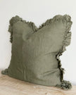 Olive green square linen cushion cover with ruffled edges, soft furnishings by Ellenvale Trade, featuring a stylish ruffled design.