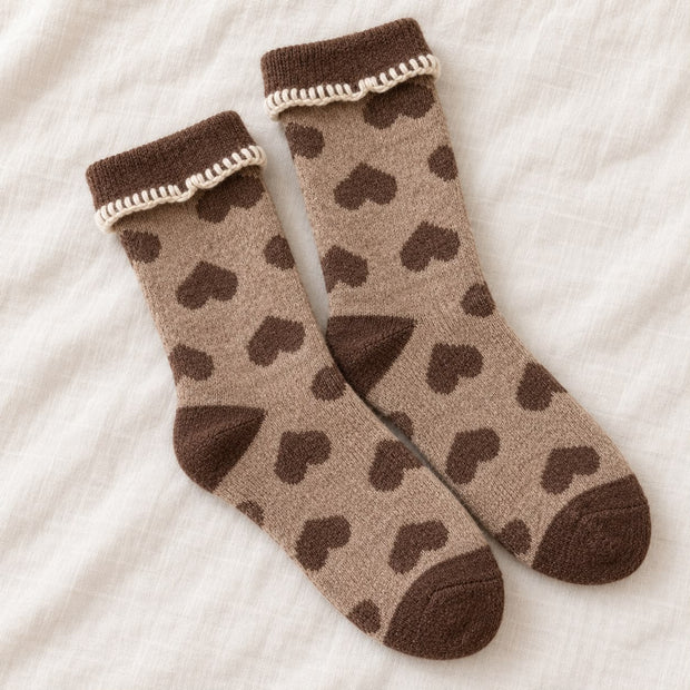Cosy Cuff Socks - Beige Heart, beige heart-patterned socks on cream fabric