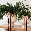 Neutral white stoneware footed vase by Gallery Direct, showcasing a smooth, rounded design with a pedestal base.