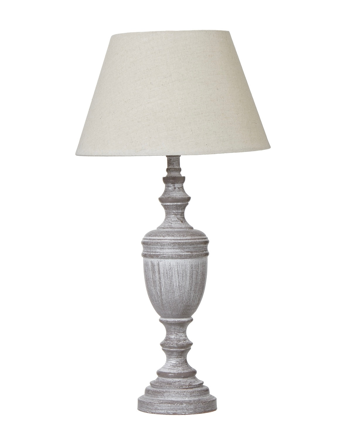 Weathered grey wooden lamp by Hill Interiors, showcasing a rustic lighting fixture with a textured wooden base.