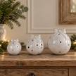 Glazed ceramic bauble ornaments with bows in Small, Medium and Large sizes styled together