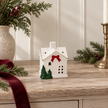 Christmas Home With Red Bow – styled British country home view