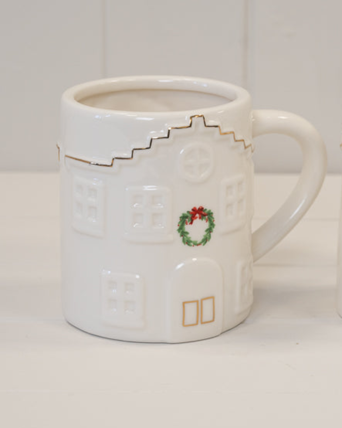 Cosy White Christmas House With Wreath Mug