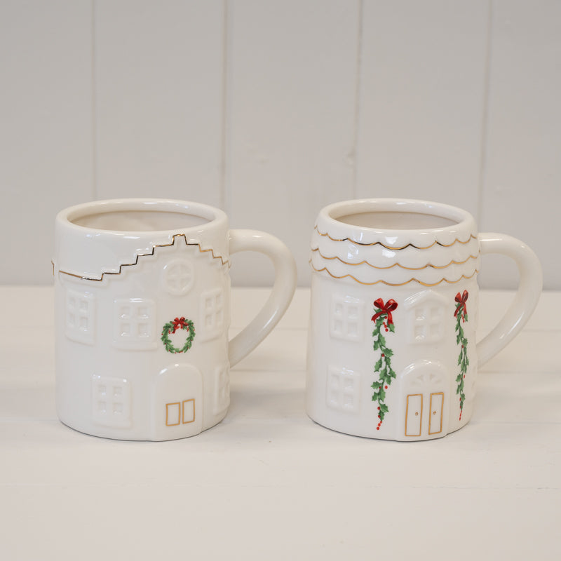 Wreath and Garland Cosy White Christmas House Mug designs shown together; each sold separately