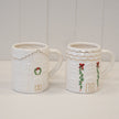 Wreath and Garland Cosy White Christmas House Mug designs shown together; each sold separately