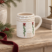 Cosy White Christmas House Mug in the Garland design styled in a warm Christmas interior
