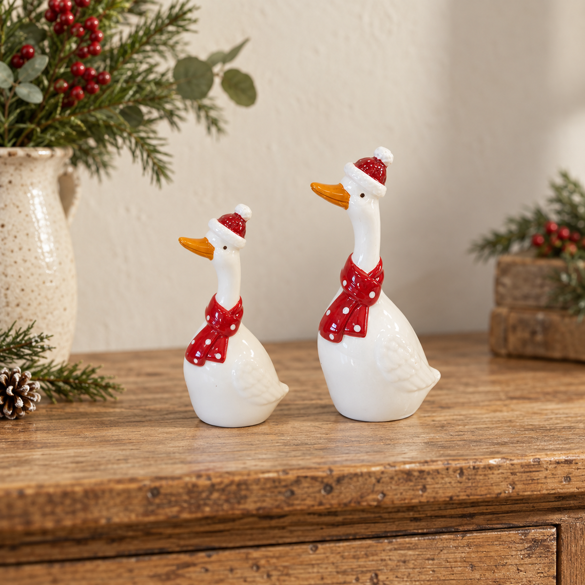 Ceramic Christmas geese with scarves in Small and Medium sizes styled side by side