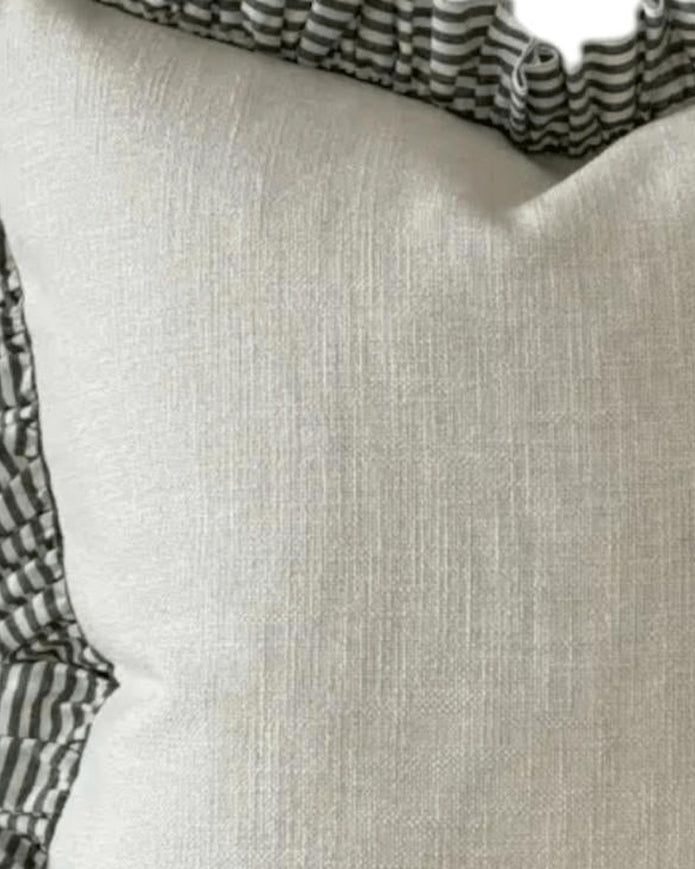 Olive green ruffle square cushion cover from Ellenvale Trade, soft furnishings with textured ruffled edge, close-up of fabric detail.