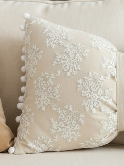 Cream neutral lace bow cushion from Starlight Express, a soft furnishings item with delicate lace and elegant bow detail.