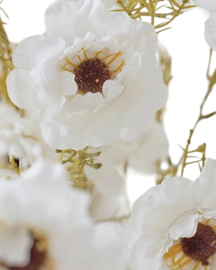 Artificial white and neutral poppy flower stem from Starlight Express, showcasing realistic blooms on a green stem.