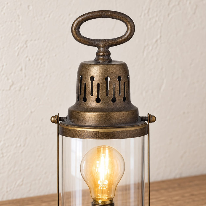 Rustic metal lantern for home decor by Heaven Sends, featuring a vintage design with glass panels and a sturdy handle.