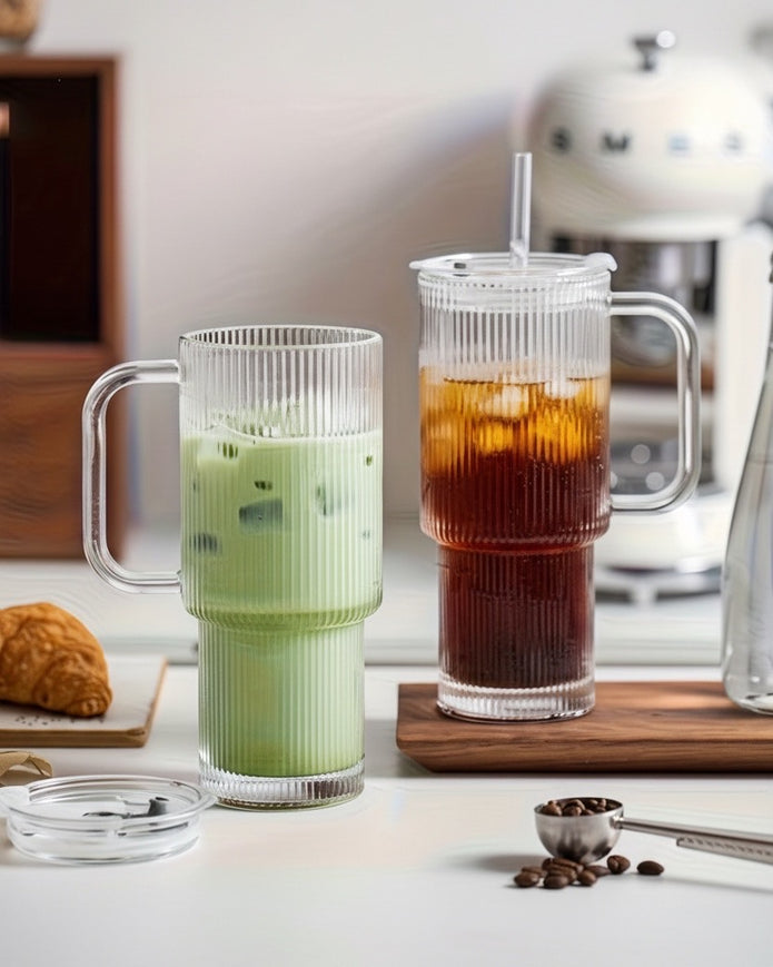 Glass ribbed Stanley-style iced coffee travel cup by Starlight Express, featuring a sleek design and secure lid for on-the-go use.