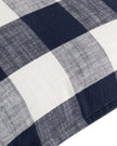 Navy blue check outdoor garden seat scatter cushion cover by Riva Home, soft furnishings for outdoor seating.