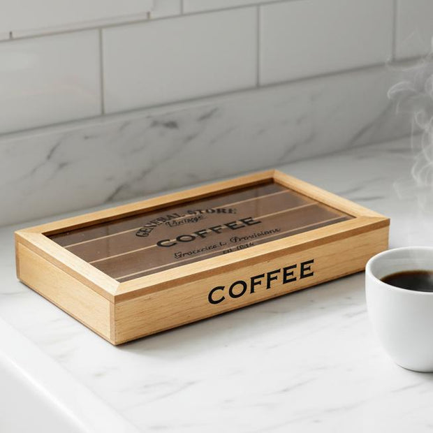 Nespresso Coffee Pod Wooden Storage Box, wooden coffee pod box with a glass lid on a kitchen counter