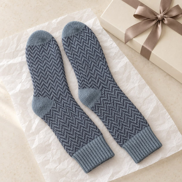 Blue Herringbone Cosy Socks, blue herringbone socks beside a wrapped gift