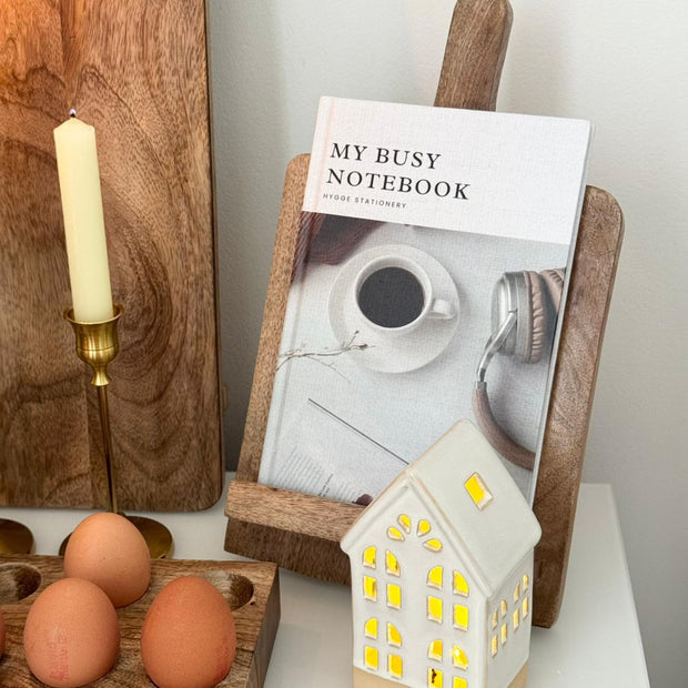 Wooden Recipe Book Holder, wooden recipe stand holding a notebook in a kitchen display