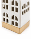 White ceramic LED light-up house decor by Sifcon, featuring a charming miniature illuminated home for cozy home accents.