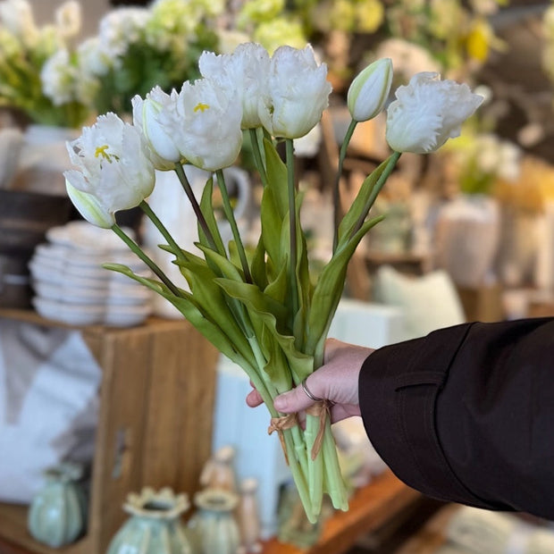 Bunch of 5 white artificial parrot tulip stems, Starlight Express spring flowers, with realistic green leaves and flower details.