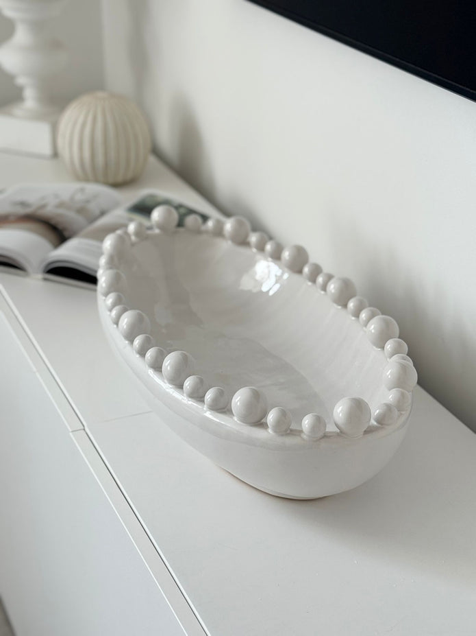 Oval Extra Large White Bobble Bowl, large oval white bobble-rim bowl on a console