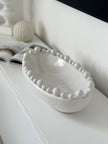 Oval Extra Large White Bobble Bowl, large oval white bobble-rim bowl on a console