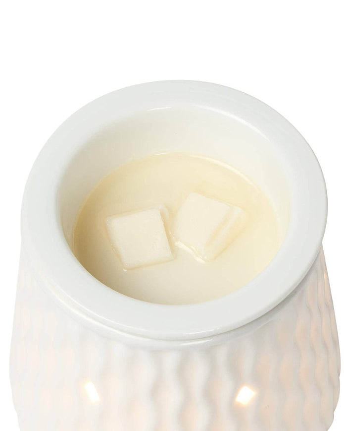White Ripple Ceramic Electric Wax Melt Burner by Devon Wick, showcasing a stylish ceramic design with a small dish for wax melts.