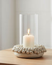 Rustic stone bobble candle hurricane lantern for home decor by Heaven Sends, featuring a textured stone design with a glass candle holder inside.