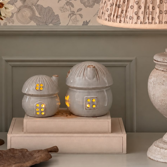 Large ceramic toadstool Christmas house by Satchville, light-up holiday decoration with festive design and vibrant colors.