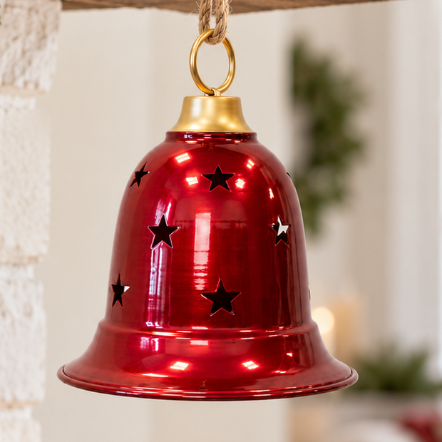 Large burgundy metal Christmas bell with cutout design by Satchville, featuring a festive holiday decoration appearance.