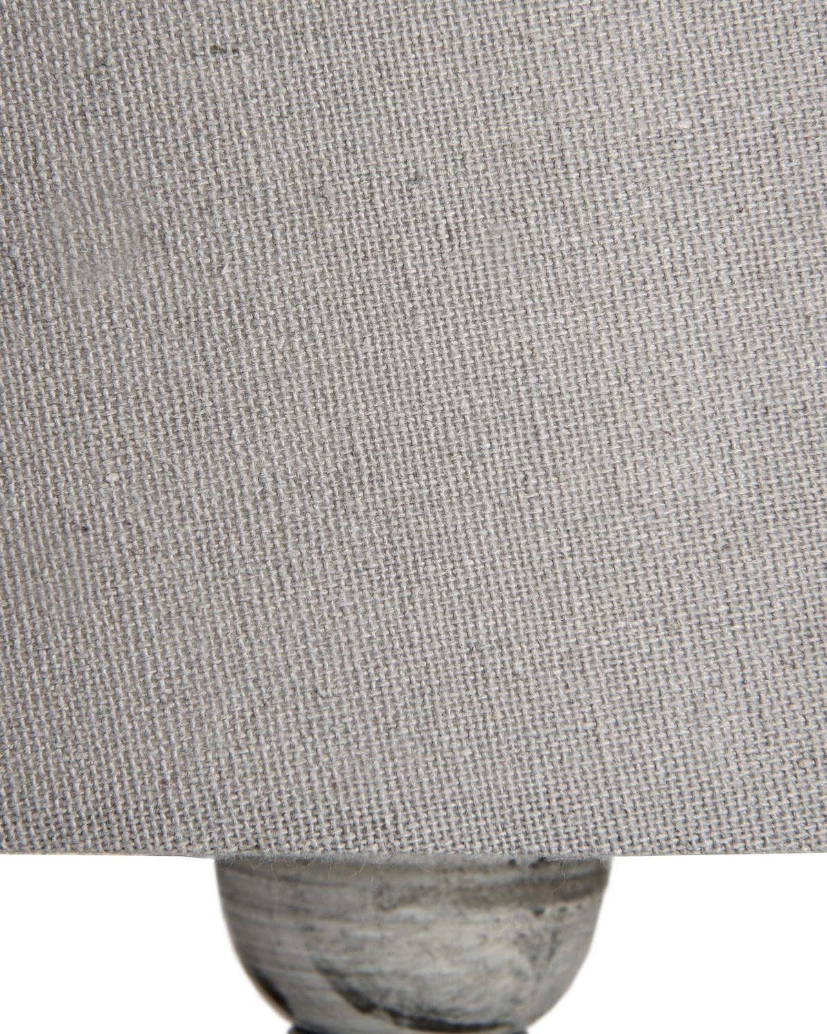 Hill Interiors Uthina Wooden Table Lamp with a sleek design, featuring a wooden base and fabric shade for modern lighting.
