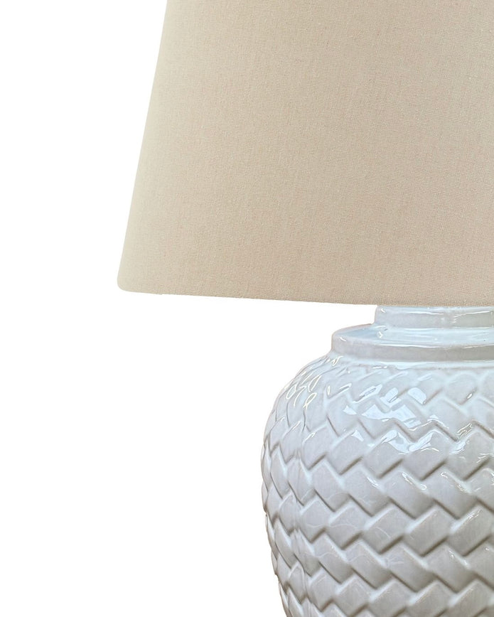 Large white weave ceramic lamp from Hill Interiors, modern lighting fixture with textured ceramic base and woven shade.