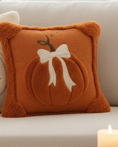 Orange Fluffy Pumpkin With Bow Cushion Cover, orange pumpkin-and-bow cushion on a cream sofa