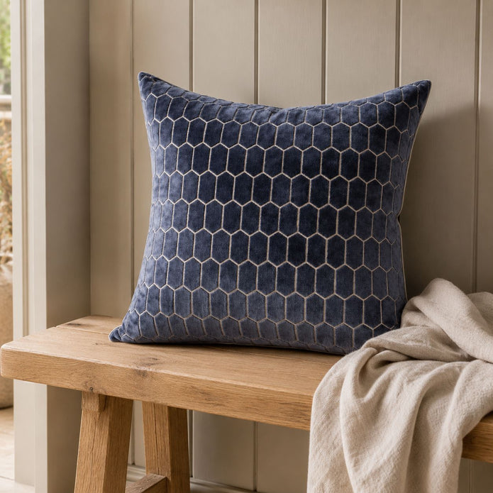 Navy Blue Velvet Honeycomb Print Cushion Cover, navy honeycomb-patterned cushion on a wooden bench