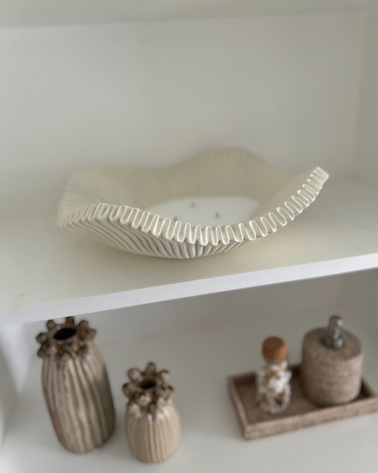 Large scalloped wavy decorative bowl from Gallery Direct, ideal for home decor display, featuring a stylish, textured design.