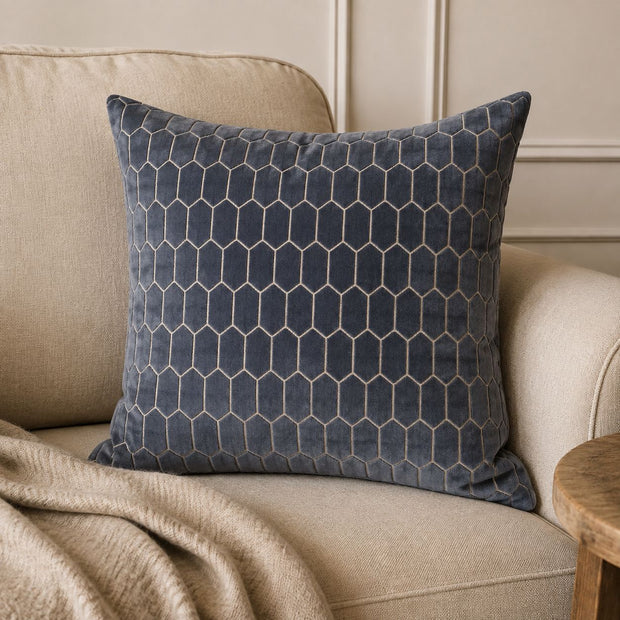 Navy Blue Velvet Honeycomb Print Cushion Cover, navy honeycomb-patterned cushion on a cream armchair