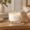 London Wax Company cedarwood and sea salt triple wick lidded candle by Widdop & Co, with a glass jar and wooden lid.