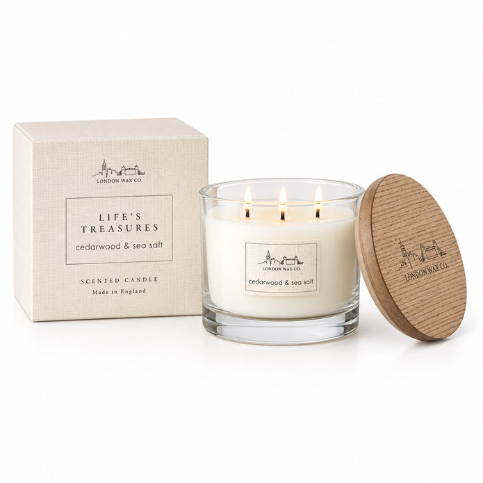 London Wax Company cedarwood and sea salt scented candle with triple wicks in a lidded glass jar, featuring a natural candle design.