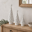 White Metal Cut Out LED Light-Up Tree, three white pierced metal trees on a console