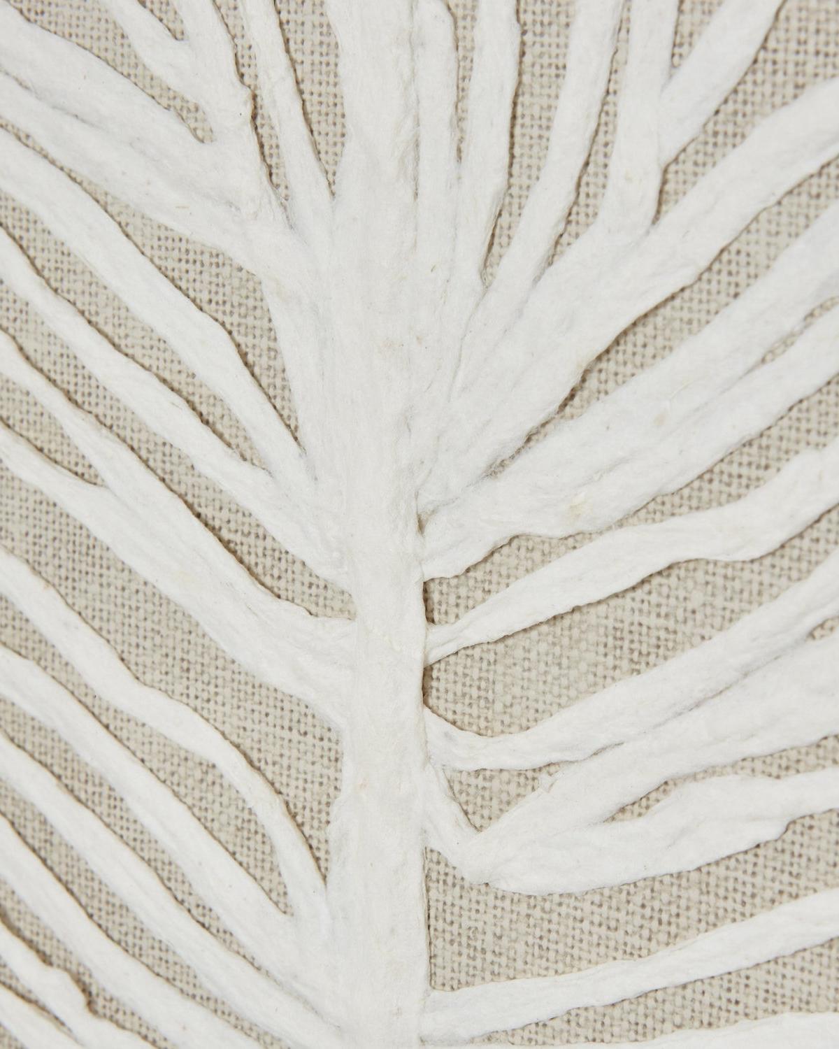 Large white feather wall art in a frame, featuring a plume design by Hill Interiors for elegant home décor.