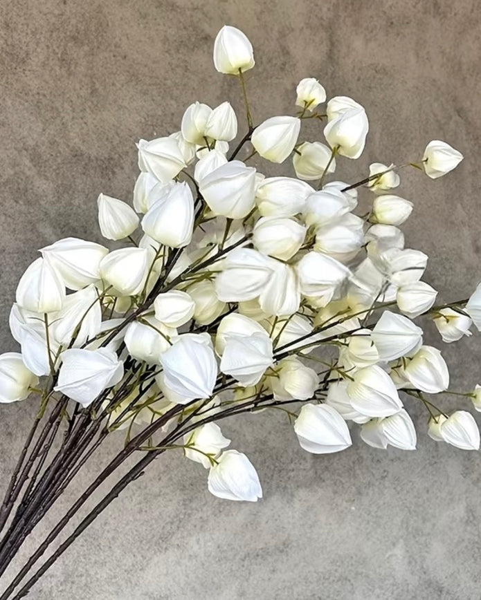 Artificial white lantern stem from Starlight Express, featuring realistic white lantern-shaped foliage for decorative use.