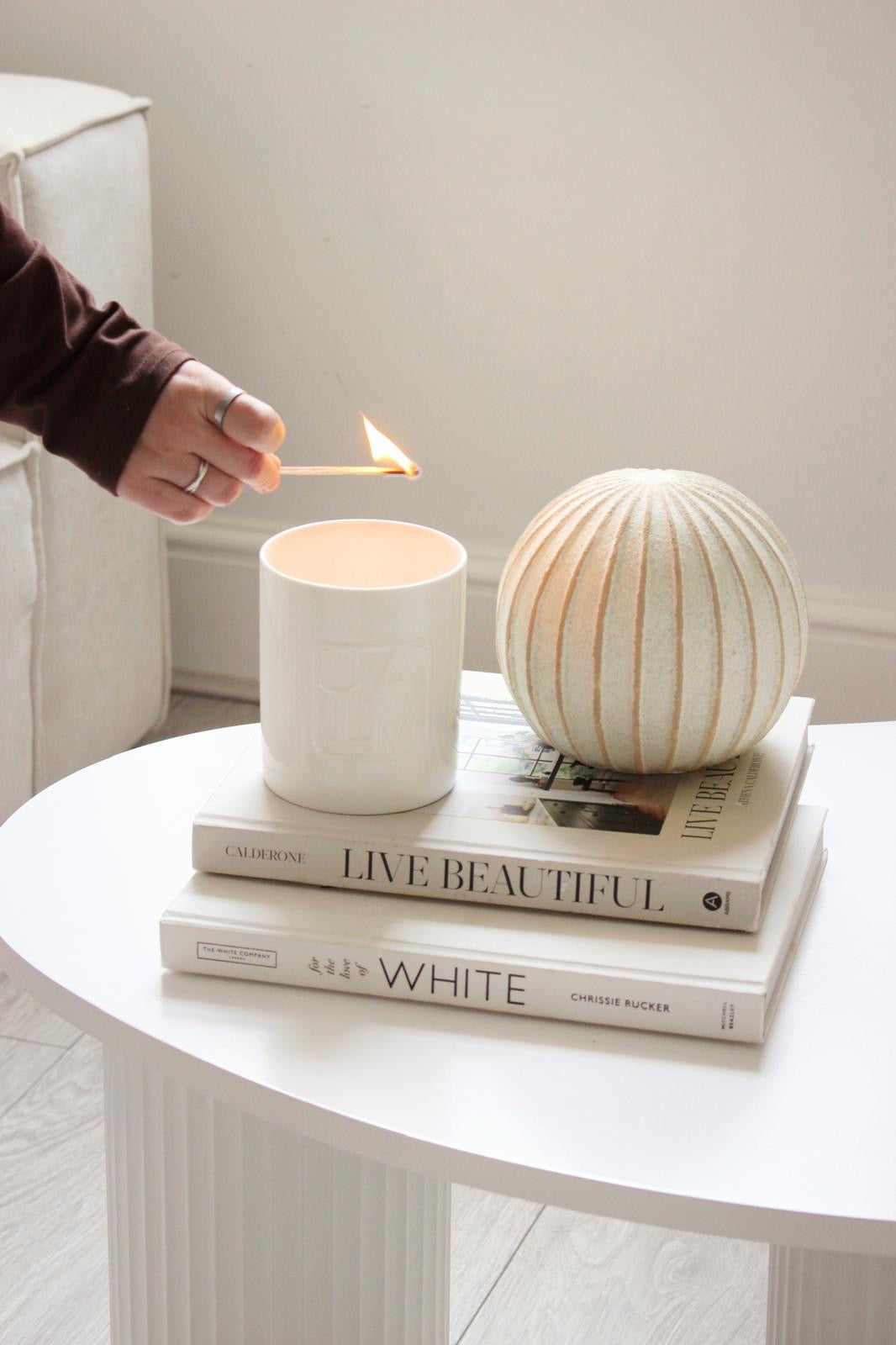 Decorative striped globe-shaped ball from Hill Interiors, perfect for home décor accents and tabletop display.