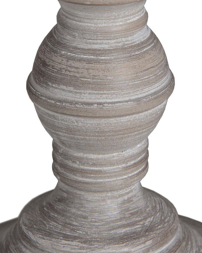 Wooden table lamp by Hill Interiors featuring a sleek, modern design with a light-colored wooden base and a neutral fabric lampshade.