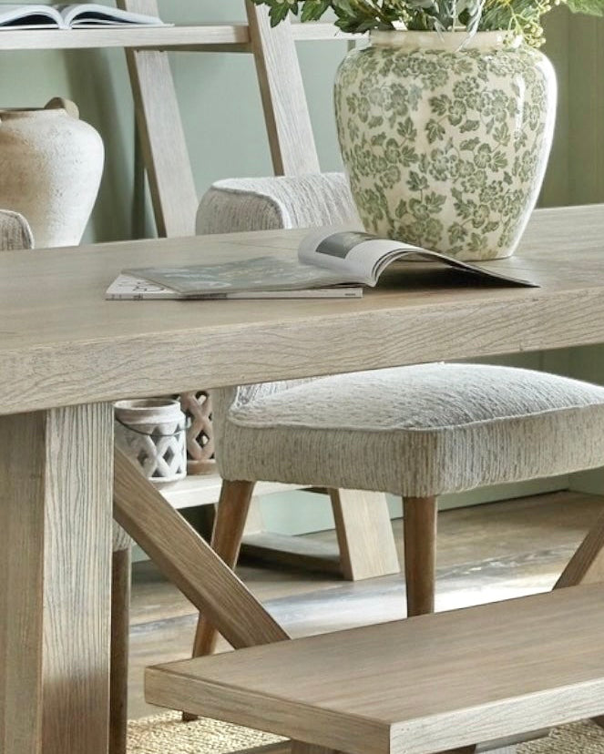 Large dining table from Hill Interiors Haldon Collection, showcasing a spacious wooden furniture piece with a polished finish.