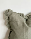 Olive green square linen cushion cover with ruffled edges from Ellenvale Trade, soft furnishings, full view of the stylish cover.