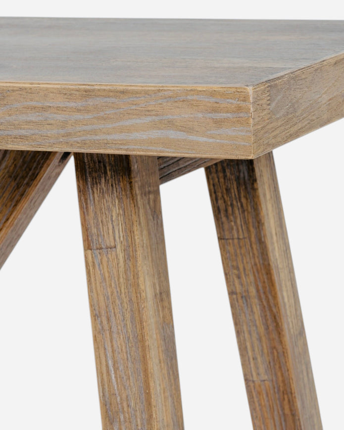 Haldon Collection wooden console table by Hill Interiors, featuring a sleek design with a smooth wood finish and sturdy legs.
