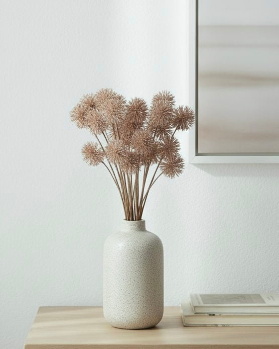 Artificial brown neutral pom pom stem from Coach House, featuring soft, rounded pom poms on a realistic plant stem.