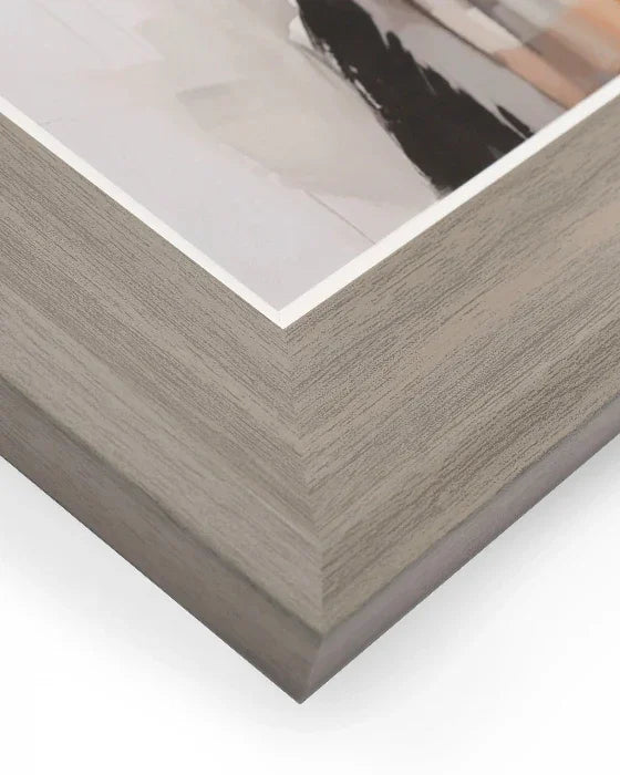 Close-up of a wooden picture frame corner on a white background